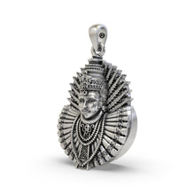 A detailed close-up of the handcrafted 925 silver Renuka Devi pendant, highlighting the intricate facial features.