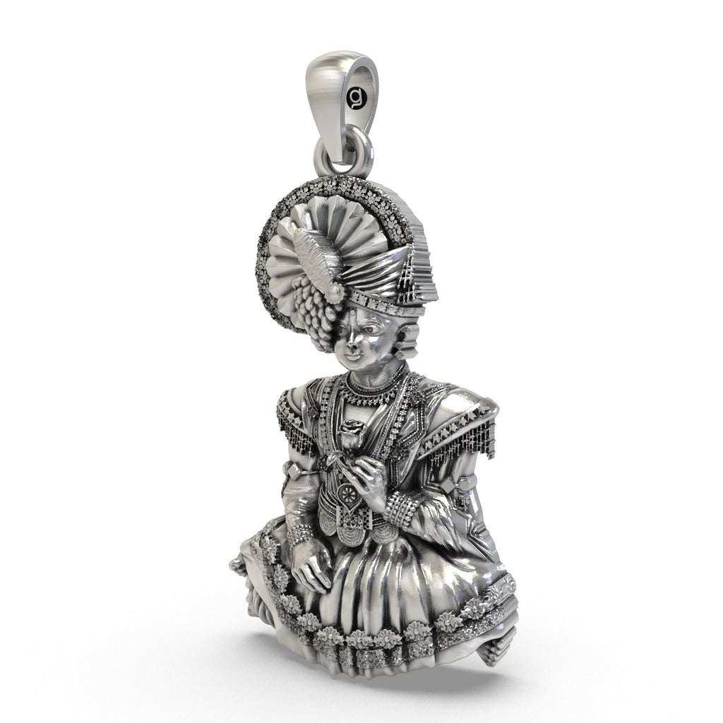 An angled profile view of the 925 Silver Swaminarayan Bhagwan Pendant, showing its divine craftsmanship.