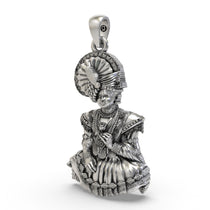 An angled profile view of the 925 Silver Swaminarayan Bhagwan Pendant, showing its divine craftsmanship.