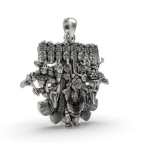 Close-up detail of the faces on the 925 silver Ganesh nine heads pendant, revealing the antique craftsmanship.