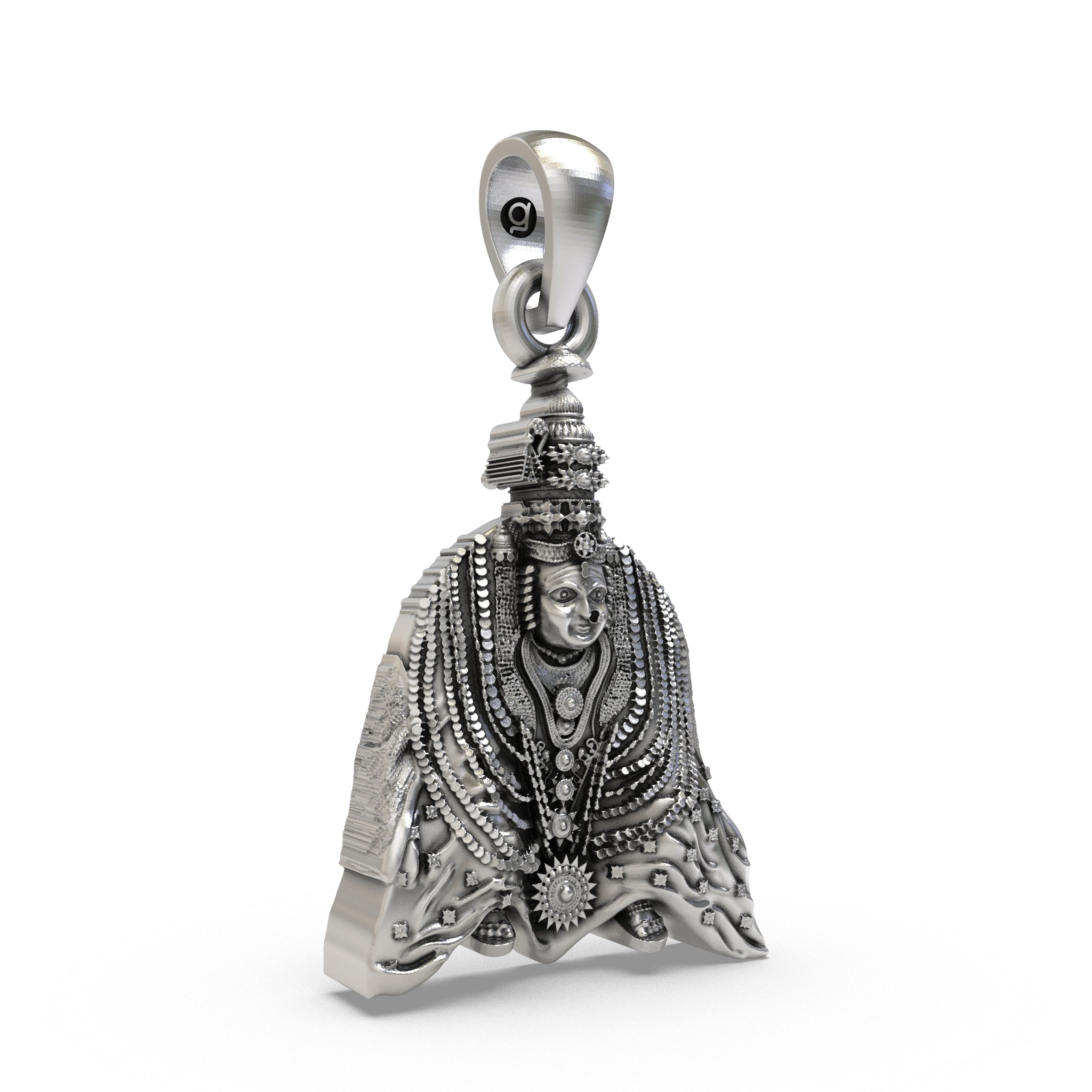 Close-up detail of the Goddess Tulja Bhavani's face on the 925 silver pendant for spiritual seekers.