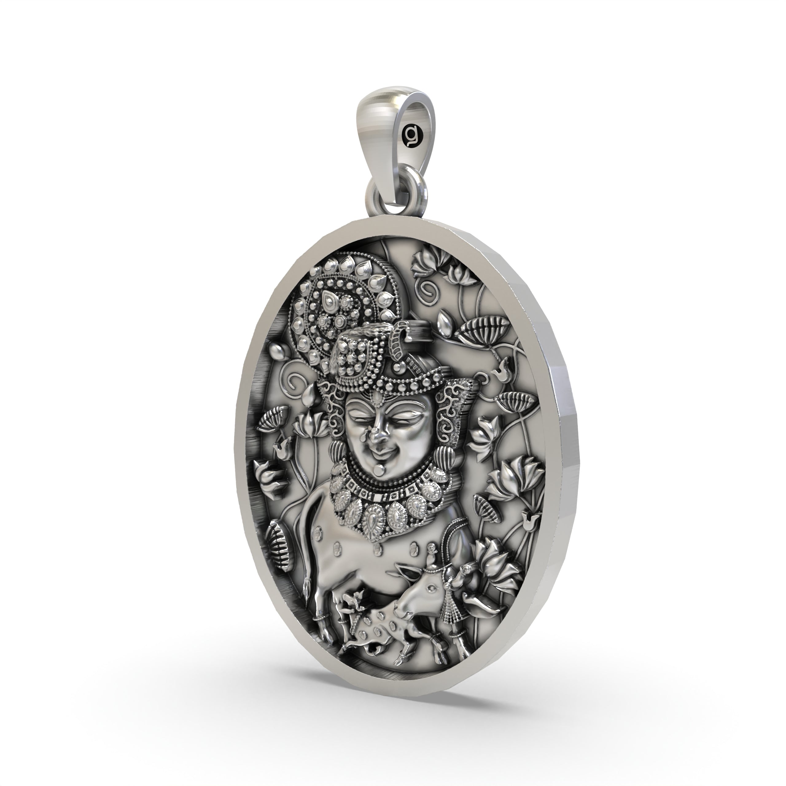 Angled view of the handcrafted Shreenathji face pendant in 925 sterling silver showing its side profile.