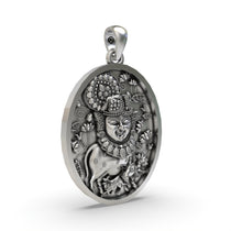 Close-up detail of the oxidized 925 silver Shreenathji pendant, highlighting the intricate facial features.