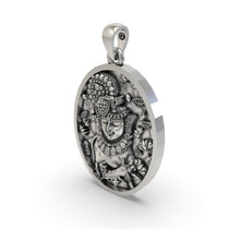 Backside view of the Nathdwara Krishna Shreenathji pendant showing the hollow design in 925 silver.