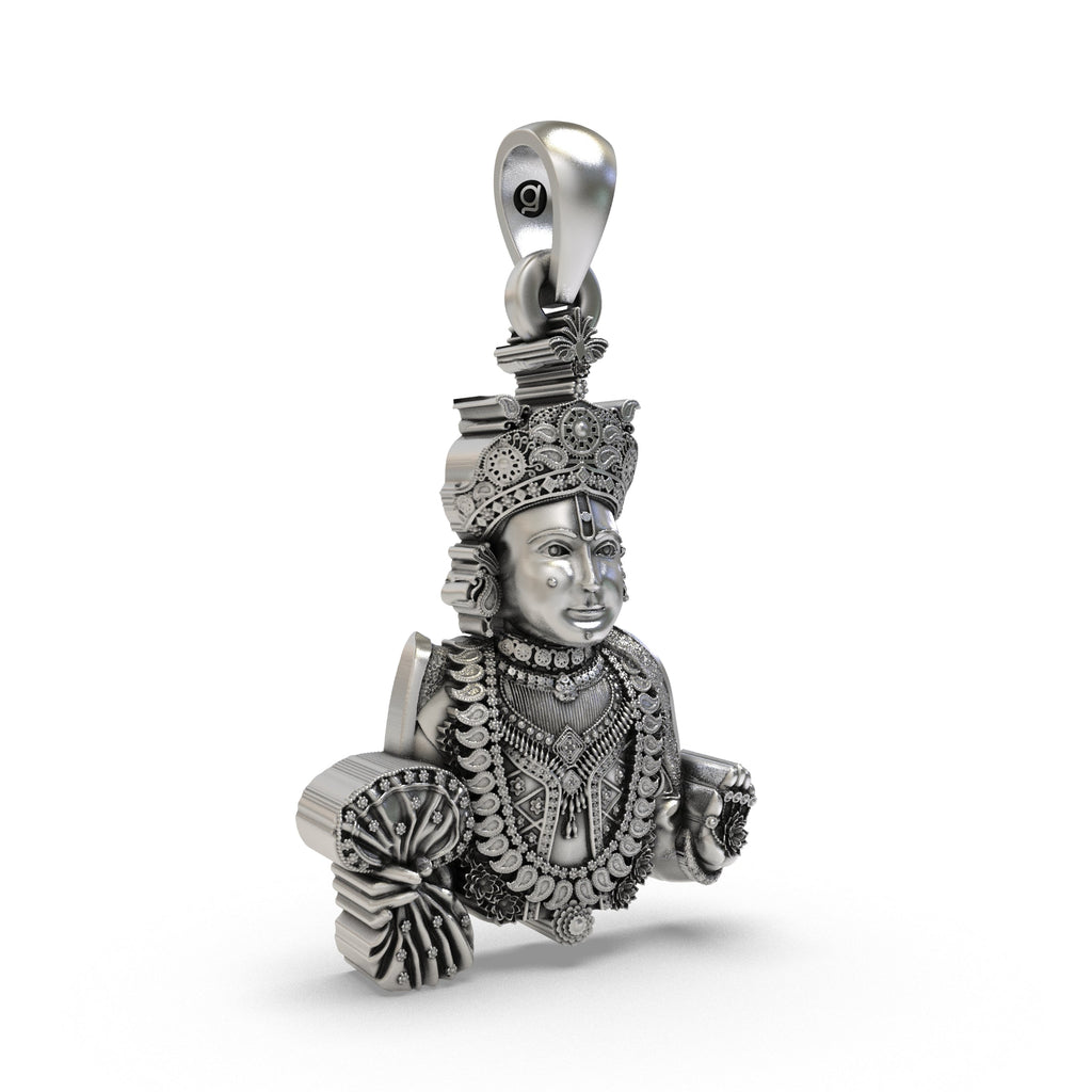 Close-up detail of the Bhagwan Swaminarayan pendant in 925 silver, emphasizing the intricate antique oxidized craftsmanship.