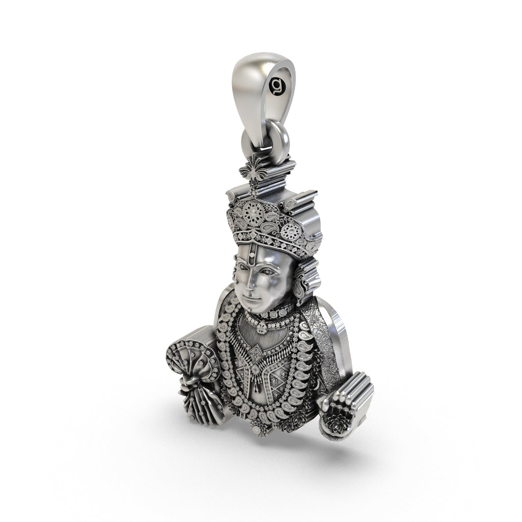 The 925 silver Swaminarayan pendant shown from an angle to display its 30mm height and beautiful spiritual design.