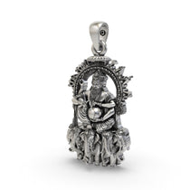 Angled view of the sterling silver Vishvakarman pendant, highlighting its polished finish and detailed craftsmanship.