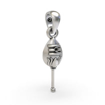 A detailed close-up of the oxidized sterling silver Murugan Vel pendant, highlighting the craftsmanship of the divine spear.