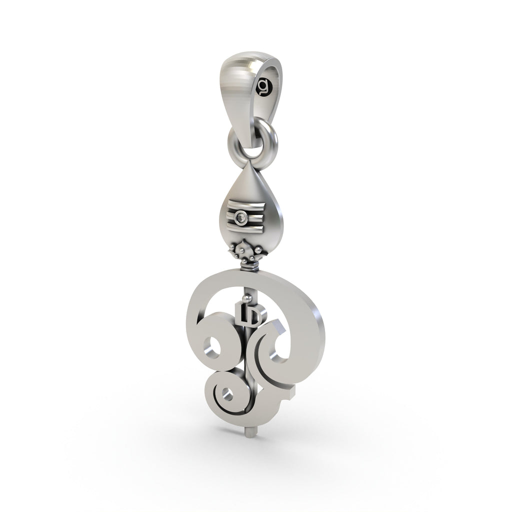 Side profile of the sterling silver Murugan Vel pendant, illustrating its slender form and hollow back for comfort.