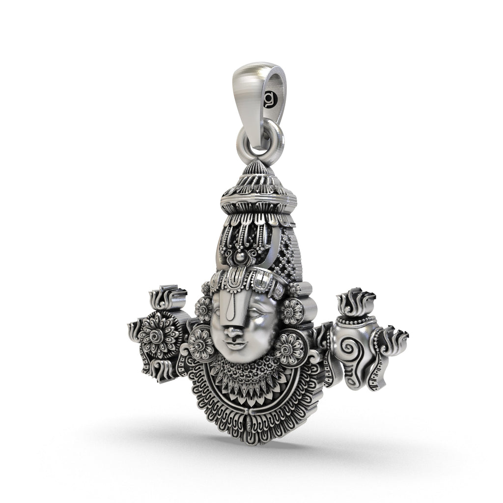A detailed close-up of the Lord Venkateswara face on a 925 silver Tirupati Balaji pendant with a polished finish.