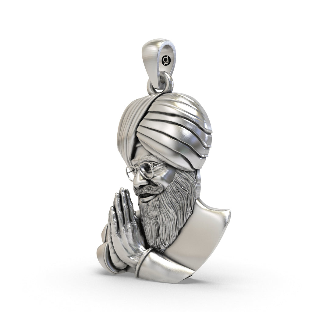 An angled view of the handcrafted 925 silver Baba Gurinder Singh Ji pendant, showcasing its spiritual design.