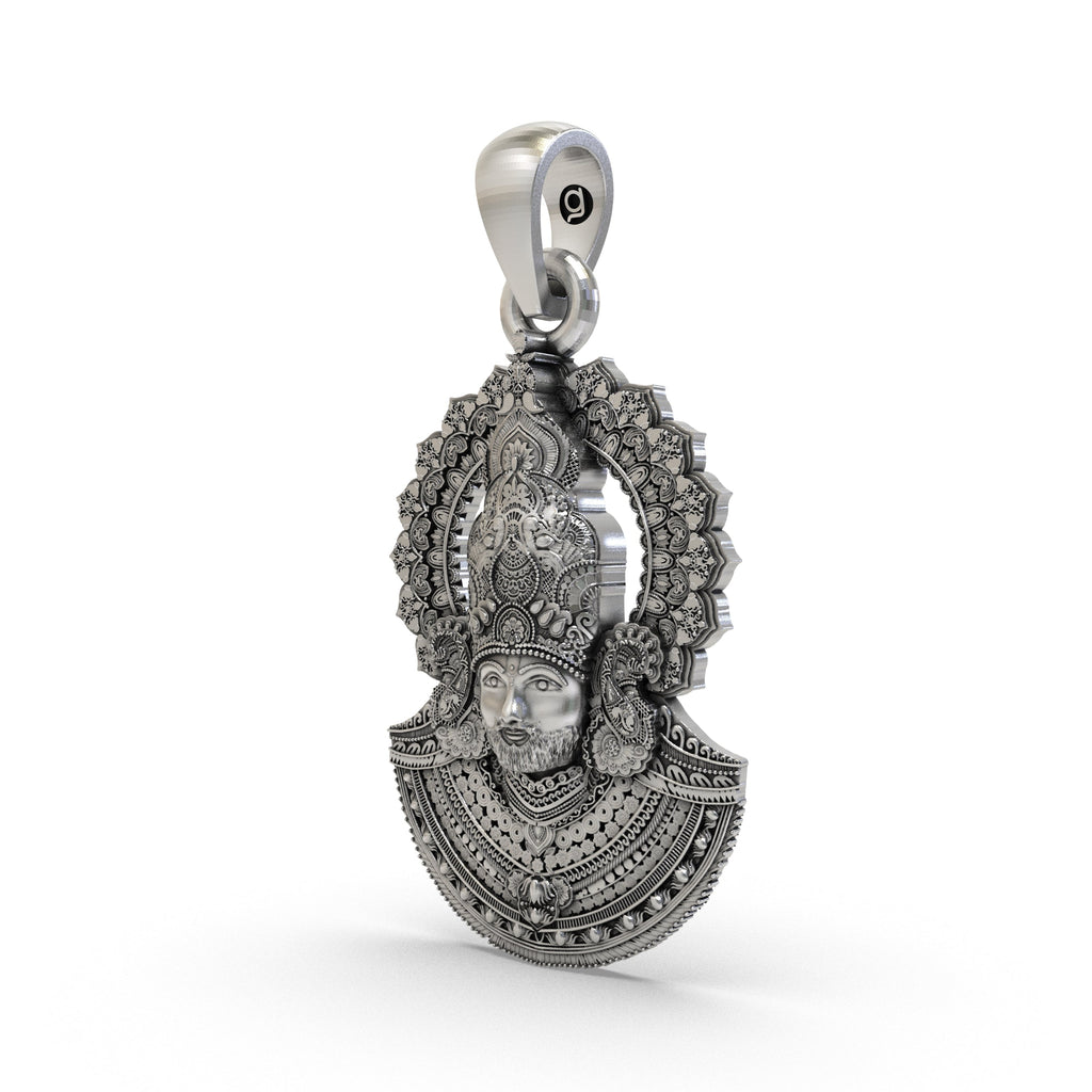 Angled shot of the pure 925 sterling silver Khatu Shyam Ji locket, highlighting its polished finish and depth.