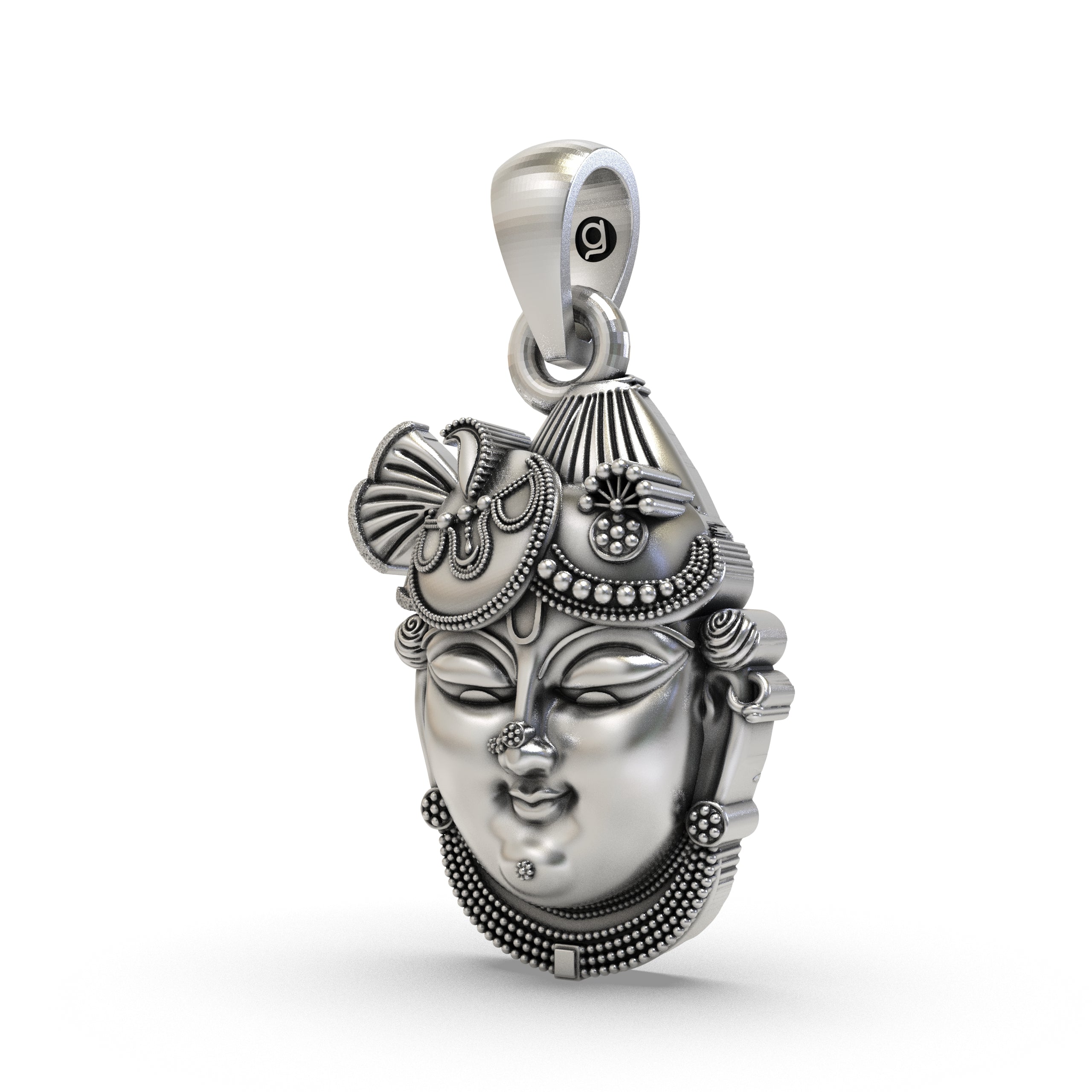 Angled profile of the Shrinathji Face Pendant, showcasing the craftsmanship and the antique oxidized silver finish.