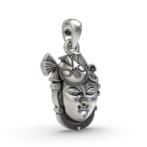 Close-up detail of the handmade 925 silver Shrinathji Face Pendant, highlighting Lord Krishna's serene expression.