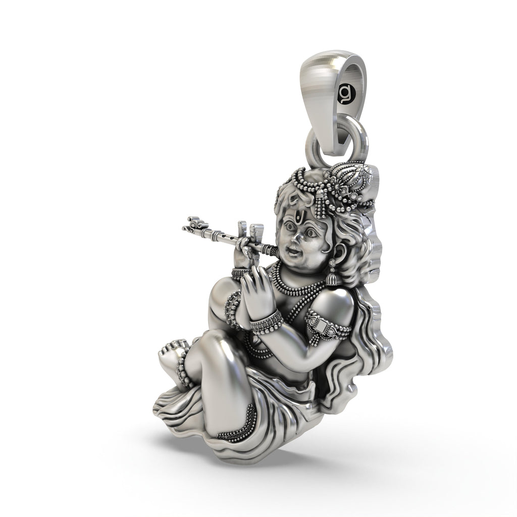 Angled side profile of the handcrafted 925 silver Bal Gopal pendant, highlighting the intricate details of the design.