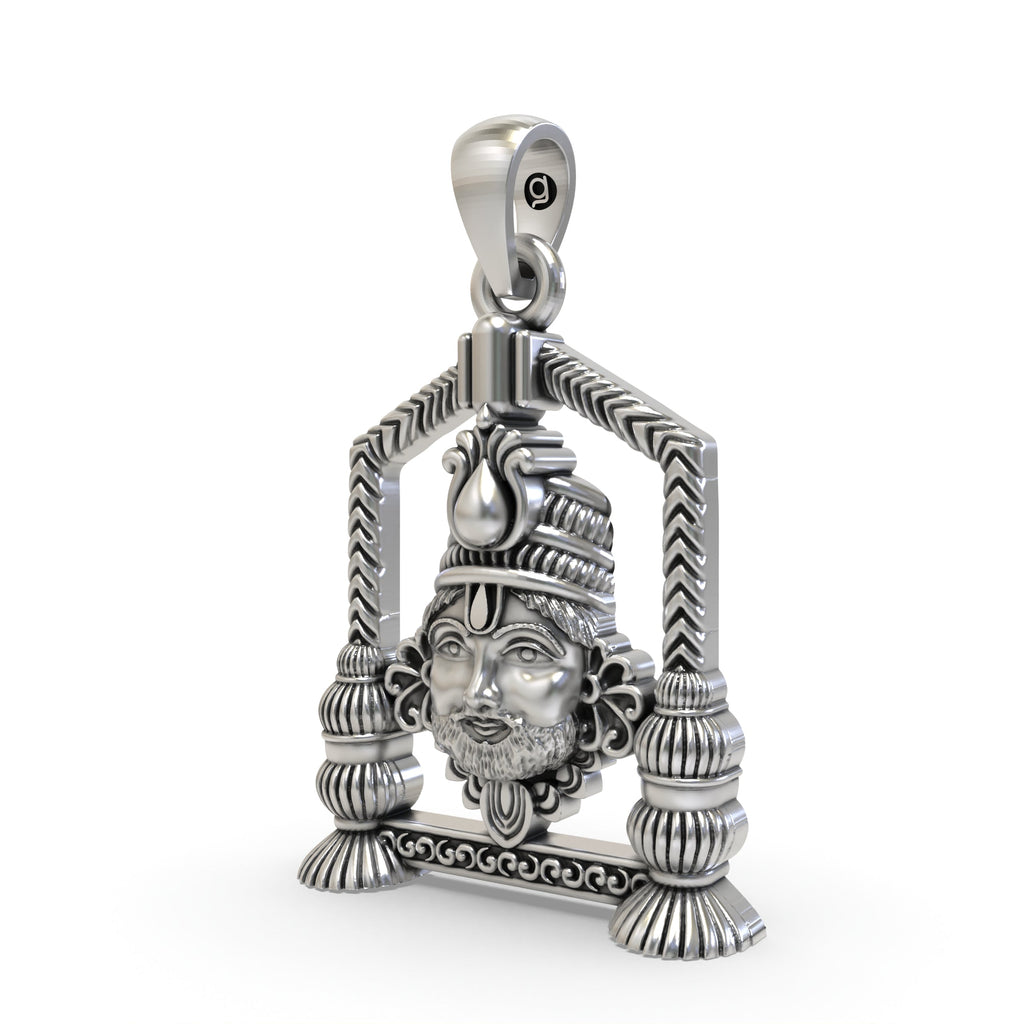 A detailed close-up of the Khatu Shyam Ji silver pendant, highlighting the compassionate expression and antique oxidized