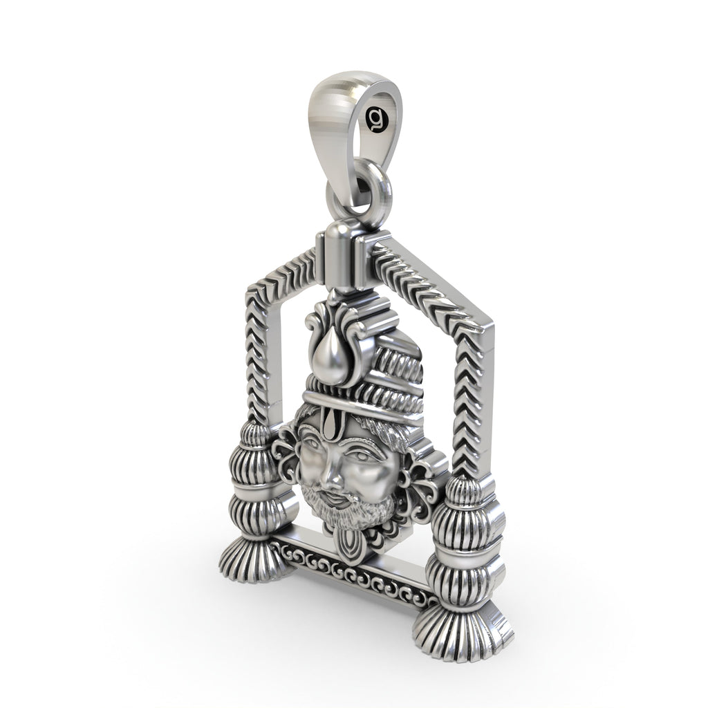 The Khatu Shyam Ji spiritual pendant in 925 silver, held to show its size and the beautiful contrast of the oxidized finish.