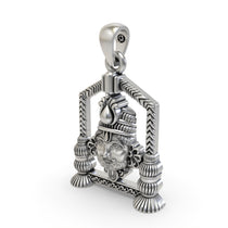The Khatu Shyam Ji spiritual pendant in 925 silver, held to show its size and the beautiful contrast of the oxidized finish.