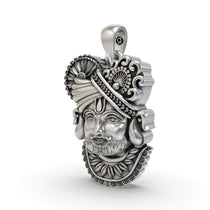 Angled view of the oxidized Khatu Shyam pendant in sterling silver, highlighting its divine craftsmanship.
