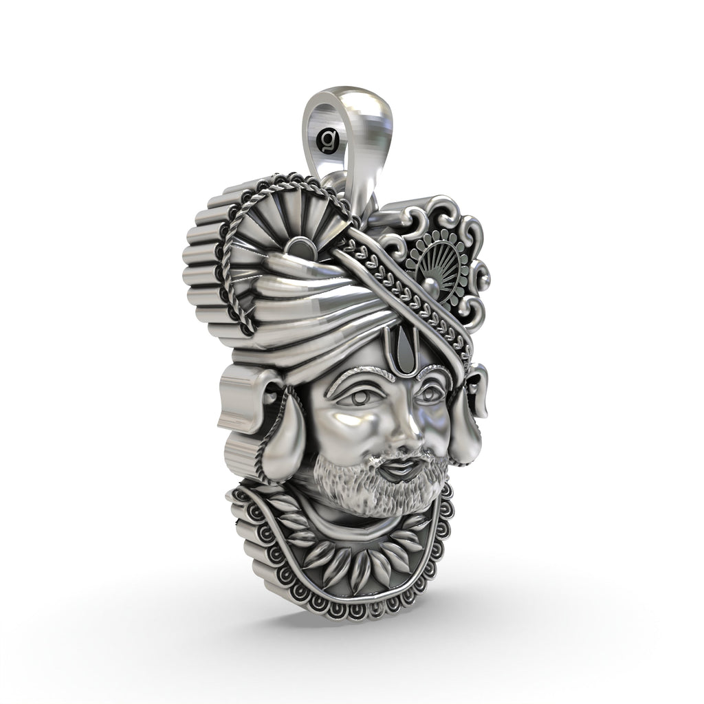 Close-up detail on the 925 silver Khatu Shyam pendant, focusing on the intricate handmade carvings.
