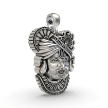 Close-up detail on the 925 silver Khatu Shyam pendant, focusing on the intricate handmade carvings.