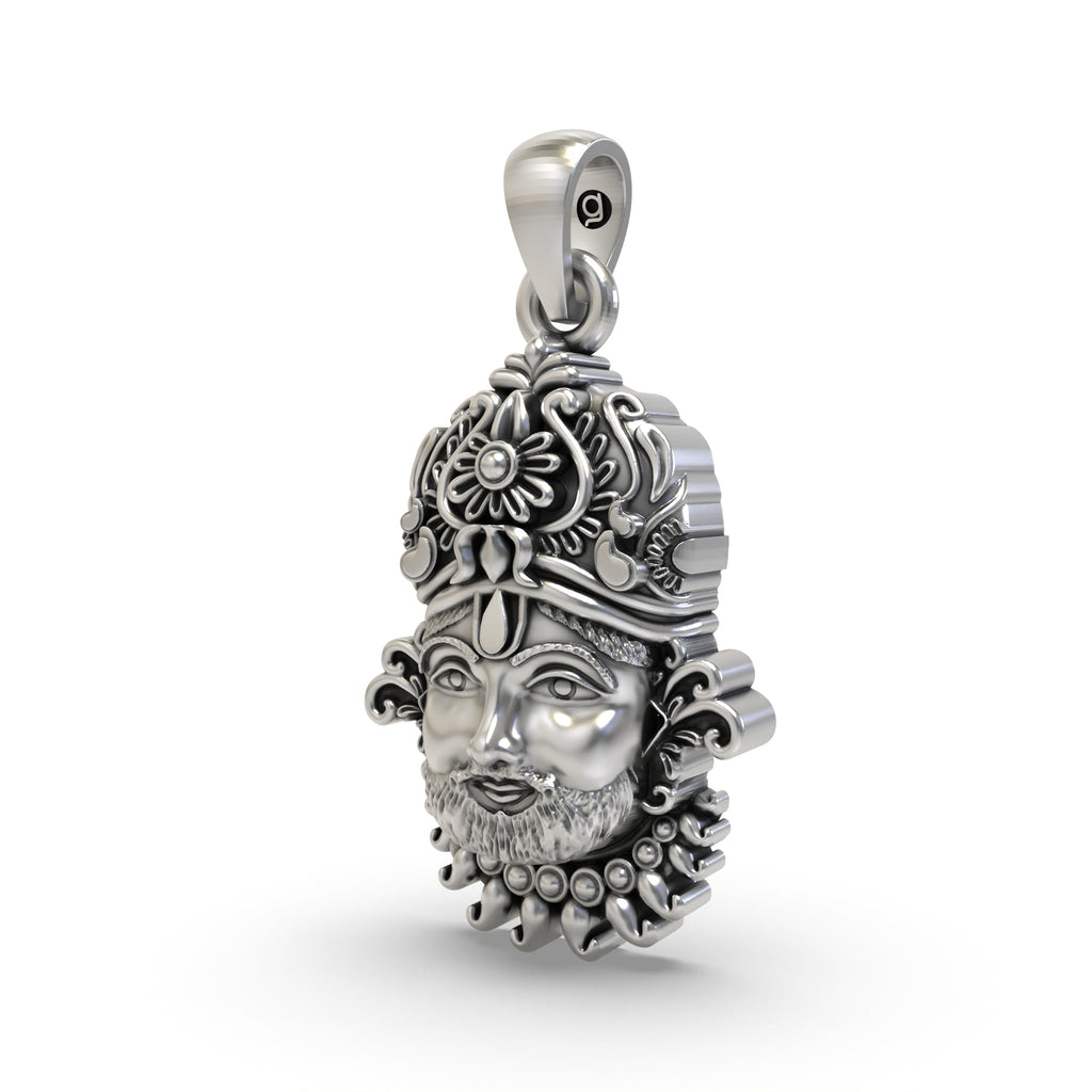 A side angle of the handcrafted Khatu Shyam pendant, highlighting the oxidized 925 silver craftsmanship.