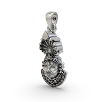 An angled side profile of the 925 silver Khatu Shyam Ji face pendant, highlighting its intricate carvings and antique finish.