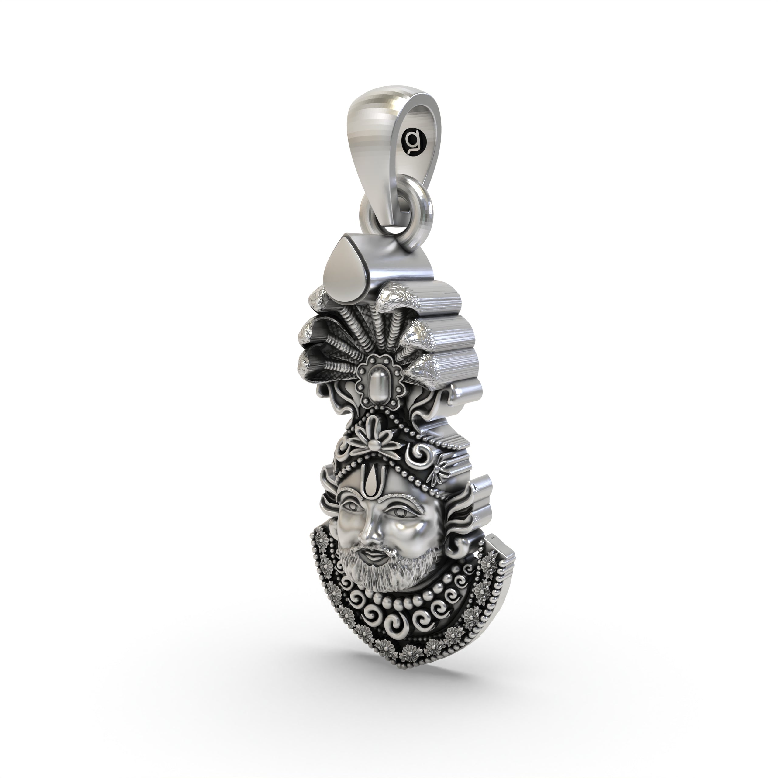 An angled side profile of the 925 silver Khatu Shyam Ji face pendant, highlighting its intricate carvings and antique finish.