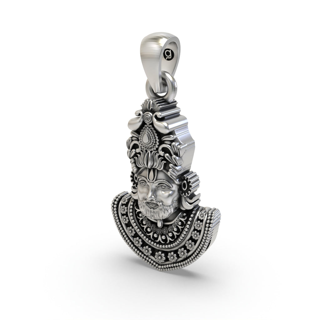 The sterling silver Khatu Shyam Ji pendant for men and women, shown from the side to display its hollow back design.