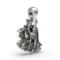 Angled view of the hallmarked 925 silver Radha Krishna pendant, displaying its lightweight hollow back design.