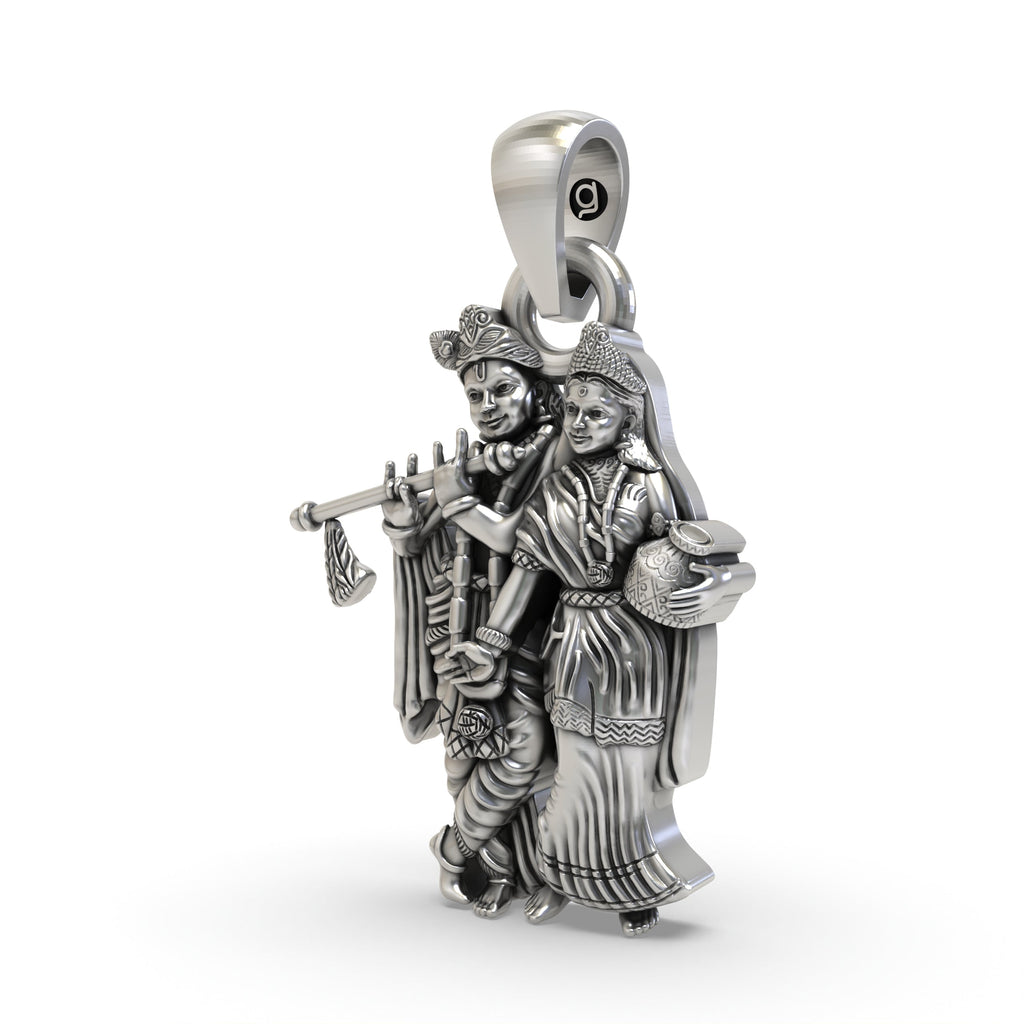 Angled view of the handmade Radha Krishna spiritual pendant in 925 sterling silver, showing its intricate design.