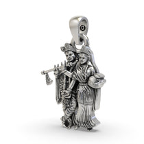 Angled view of the handmade Radha Krishna spiritual pendant in 925 sterling silver, showing its intricate design.