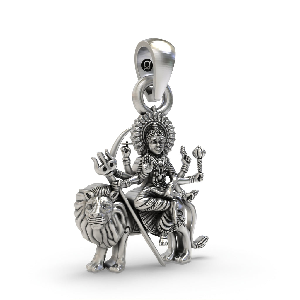 Close-up of the goddess Durga Maa's face and lion on the handcrafted 925 sterling silver Shakti pendant.