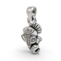 The Ganesha Face 925 Silver Pendant from a side profile, emphasizing the oxidized silver texture and hollow back design.