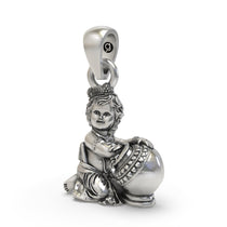 A detailed close-up of the Laddu Gopal 925 silver pendant, highlighting the antique oxidized finish and fine details.
