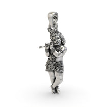 Angled side view of the Alankar Krishna flute pendant in 925 silver, highlighting its lightweight hollow back design.