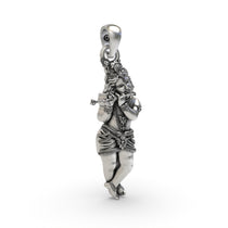 Detailed close-up of the oxidized 925 silver Krishna pendant, showcasing the intricate craftsmanship of the divine flute.