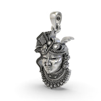 Angled side profile of the Nathdwara-inspired Shrinathji face pendant, showcasing its 925 silver craftsmanship.