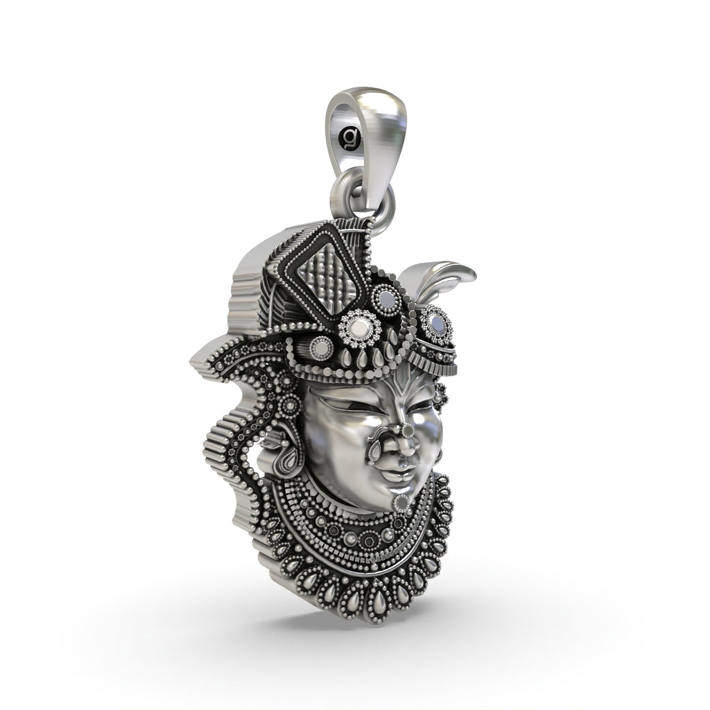 Close-up shot highlighting the intricate details and oxidized texture of the 925 sterling silver Shrinathji pendant.