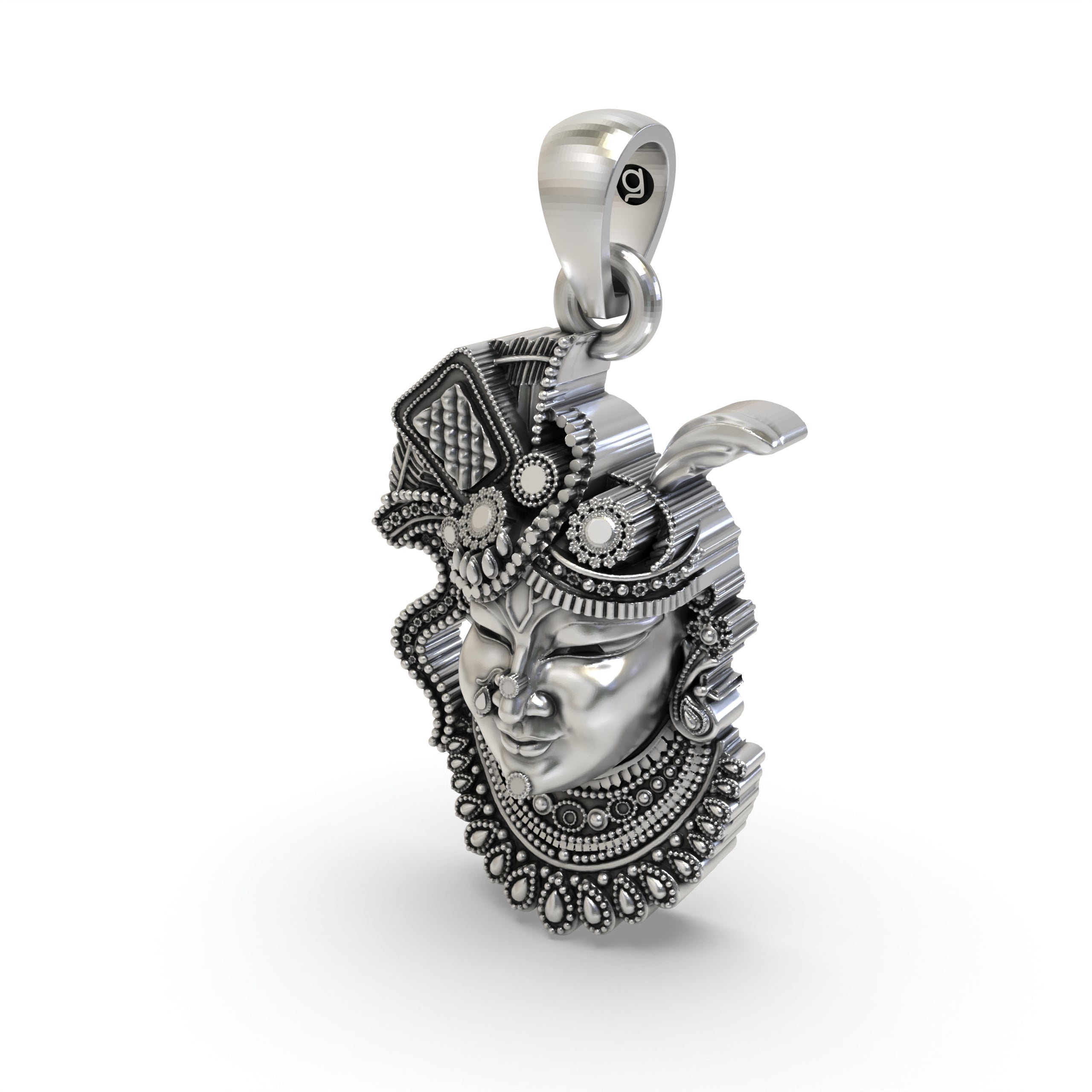 The 925 silver Shrinathji face pendant shown from a different angle to display its hollow back design for comfort.