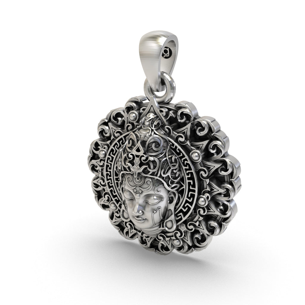 Handmade 925 sterling silver Buddha face pendant shown with a chain to illustrate its size as a piece of Zen jewelry.
