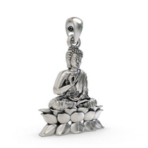 Close-up detail of the meditating Buddha figure on a lotus flower in this 925 silver zen charm necklace.