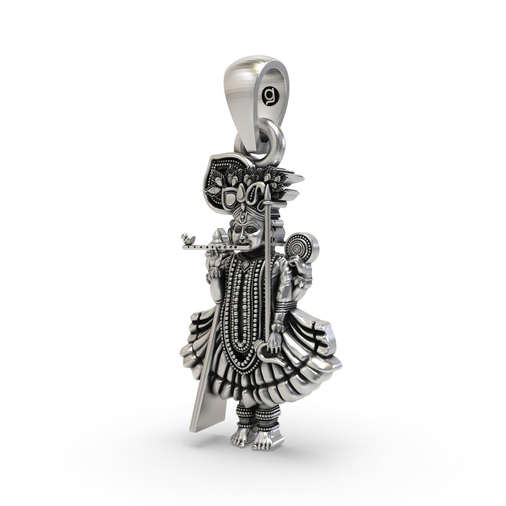 A detailed close-up of the handmade Ranchhodraiji pendant in oxidized sterling silver, highlighting the intricate craft.