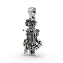 A detailed close-up of the handmade Ranchhodraiji pendant in oxidized sterling silver, highlighting the intricate craft.