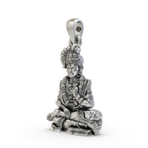 Angled view of the spiritual 925 silver Swaminarayan locket showing its divine details for men and women.