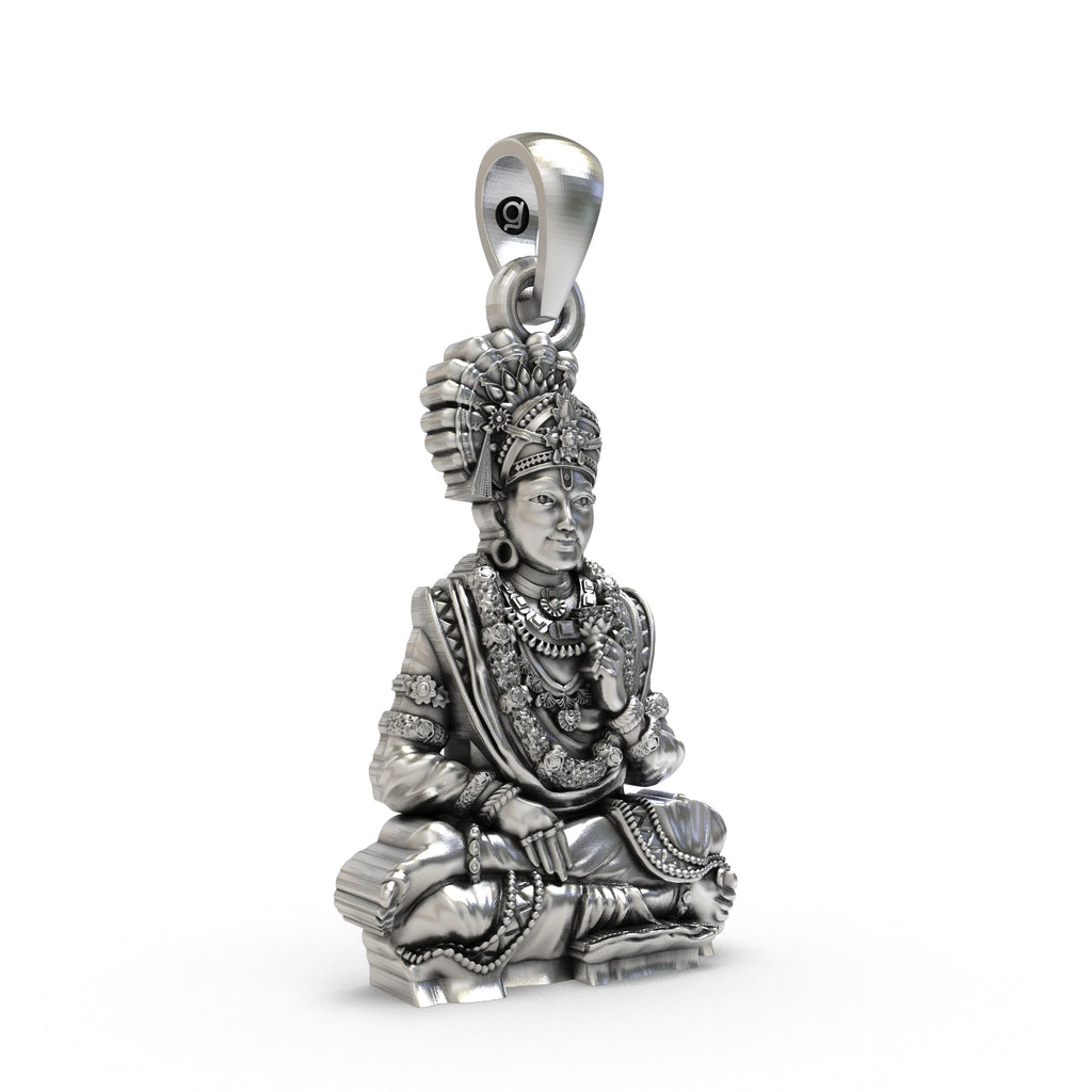 Close-up of the Akshar Purushottam form on the handcrafted 925 sterling silver Swaminarayan pendant.