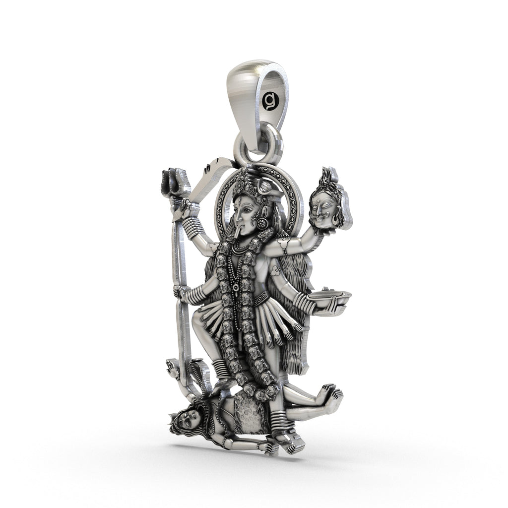 An angled view of the 925 silver Kali Ma locket, highlighting the depth and oxidized finish of the spiritual jewelry.