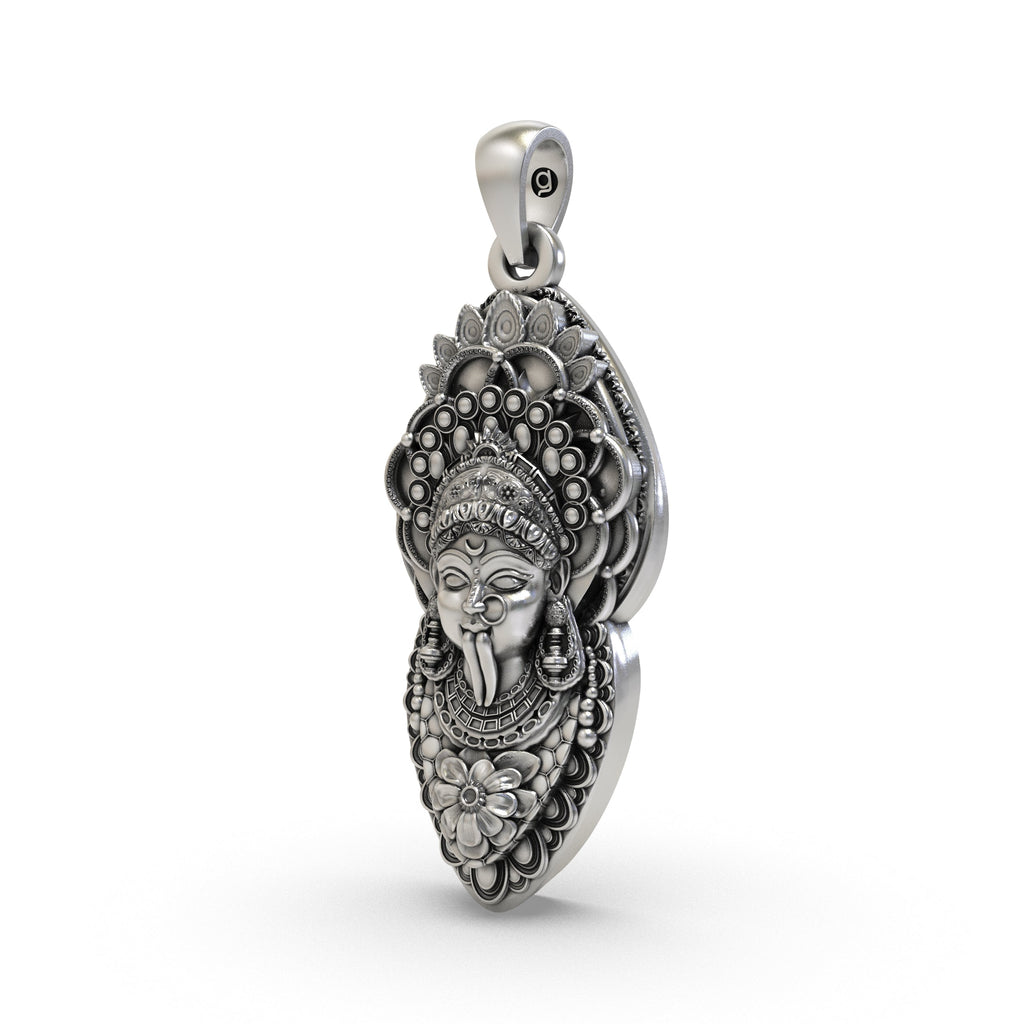 Angled profile of the sterling silver Kali Ma locket, highlighting the oxidized finish and intricate details.