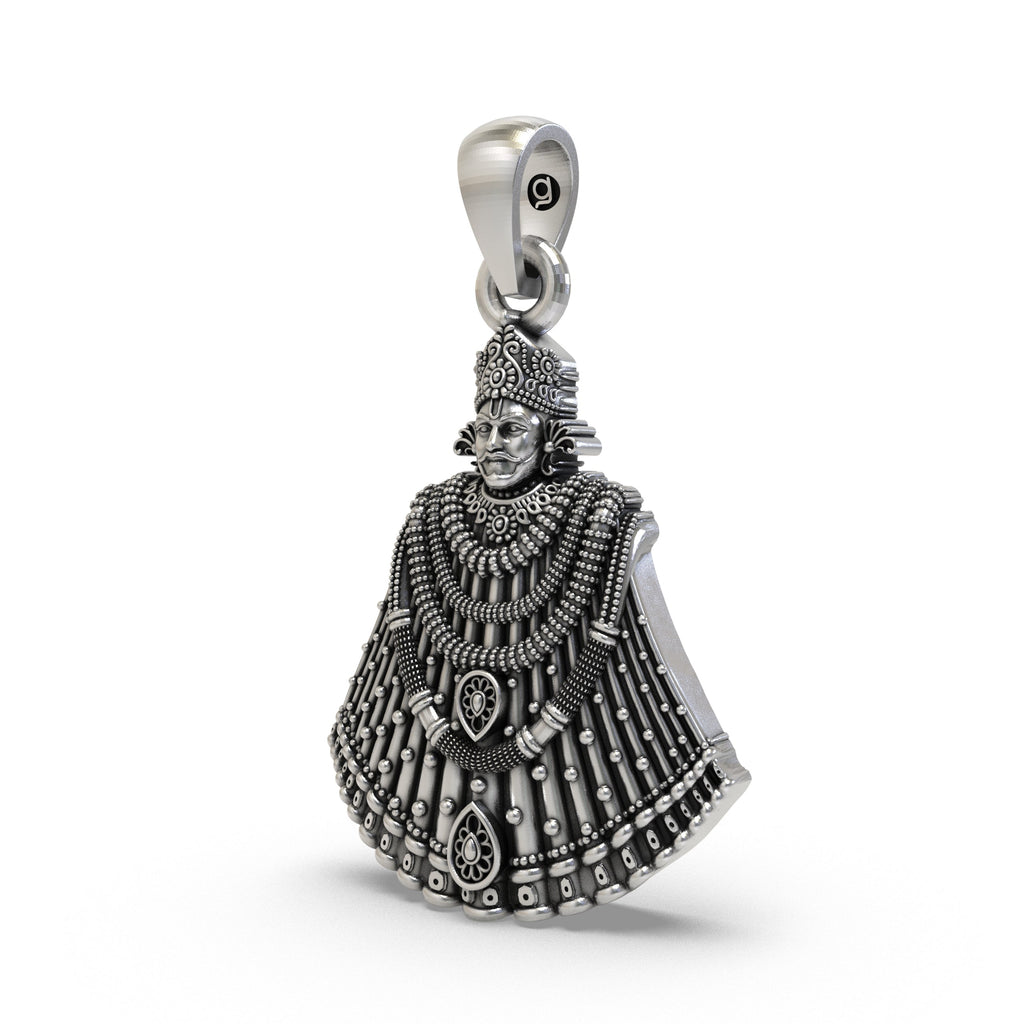 Angled side profile of the Khatu Shyam Ji locket in sterling silver, highlighting its beautiful oxidized finish.