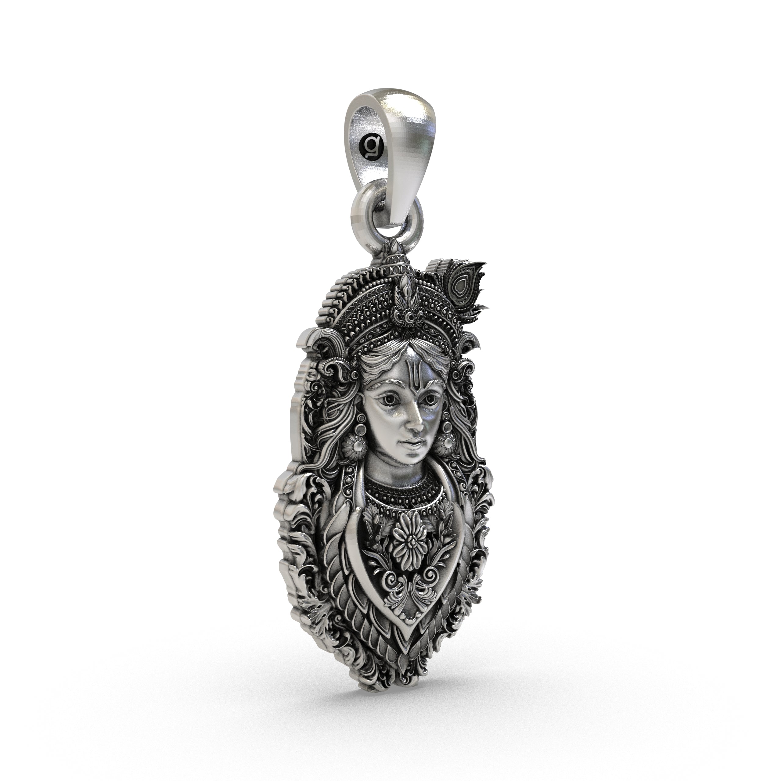 Detailed close-up of the Bal Krishna silver locket, showcasing the craftsmanship and antique oxidized finish.